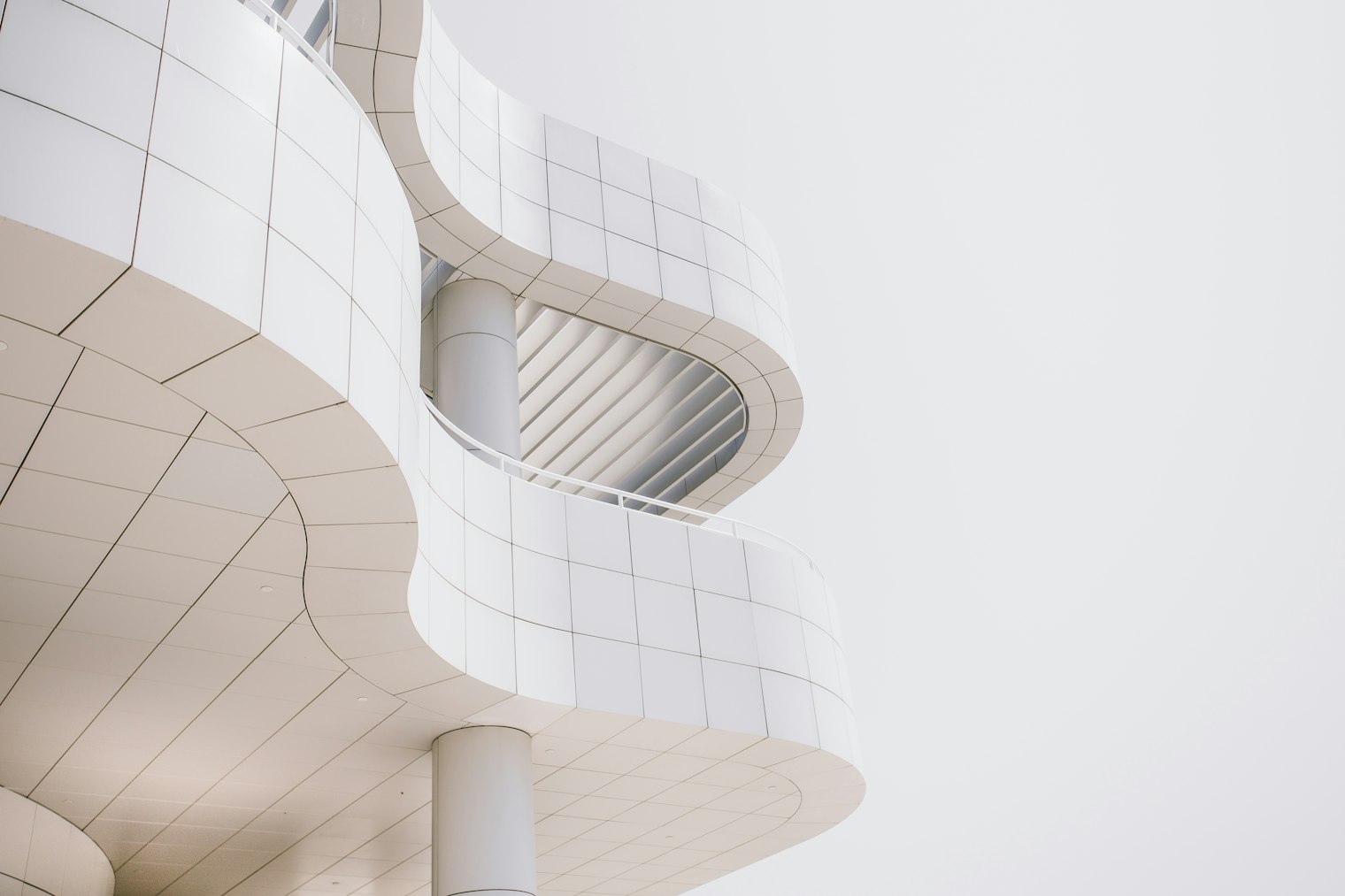 A building facade of identical repeating modules seen head-on