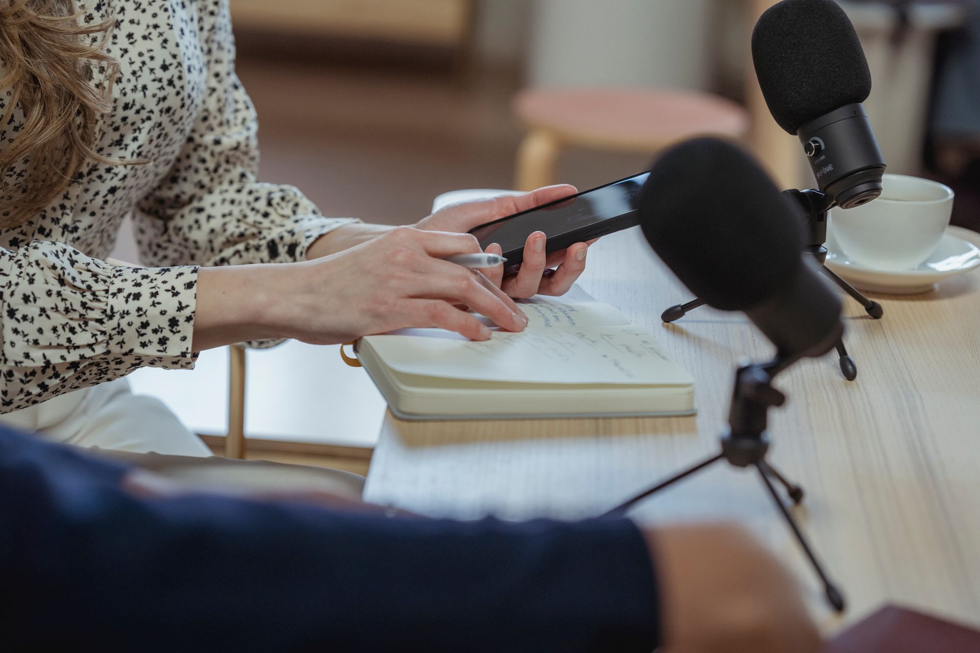 An interview being recorded in notes