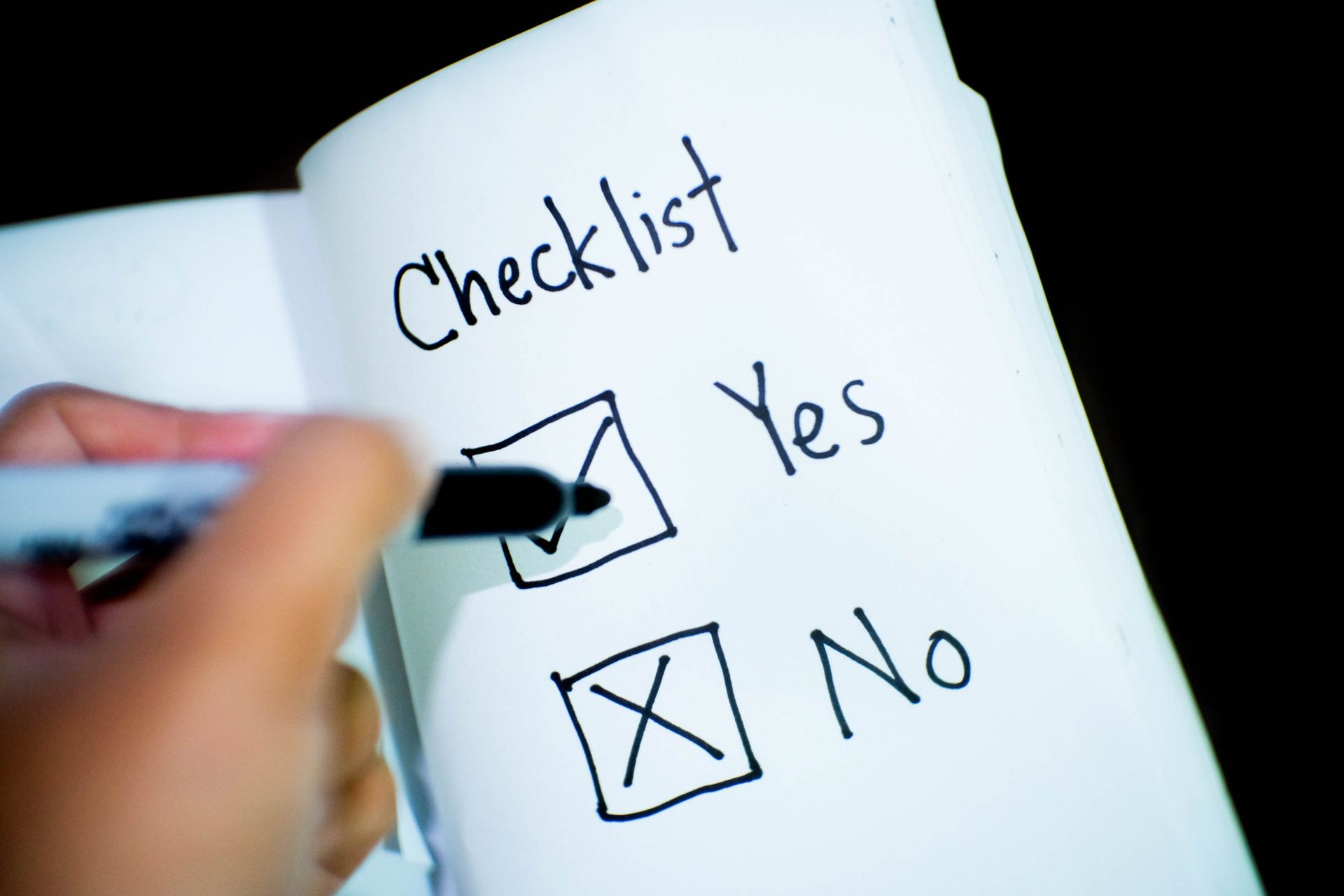 A printed checklist with most items crossed out