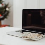 An affiliate earnings dashboard on a laptop