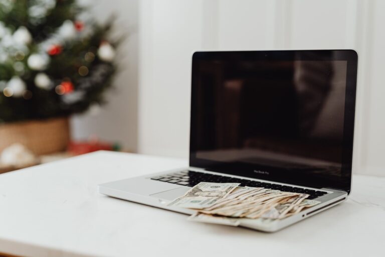 An affiliate earnings dashboard on a laptop