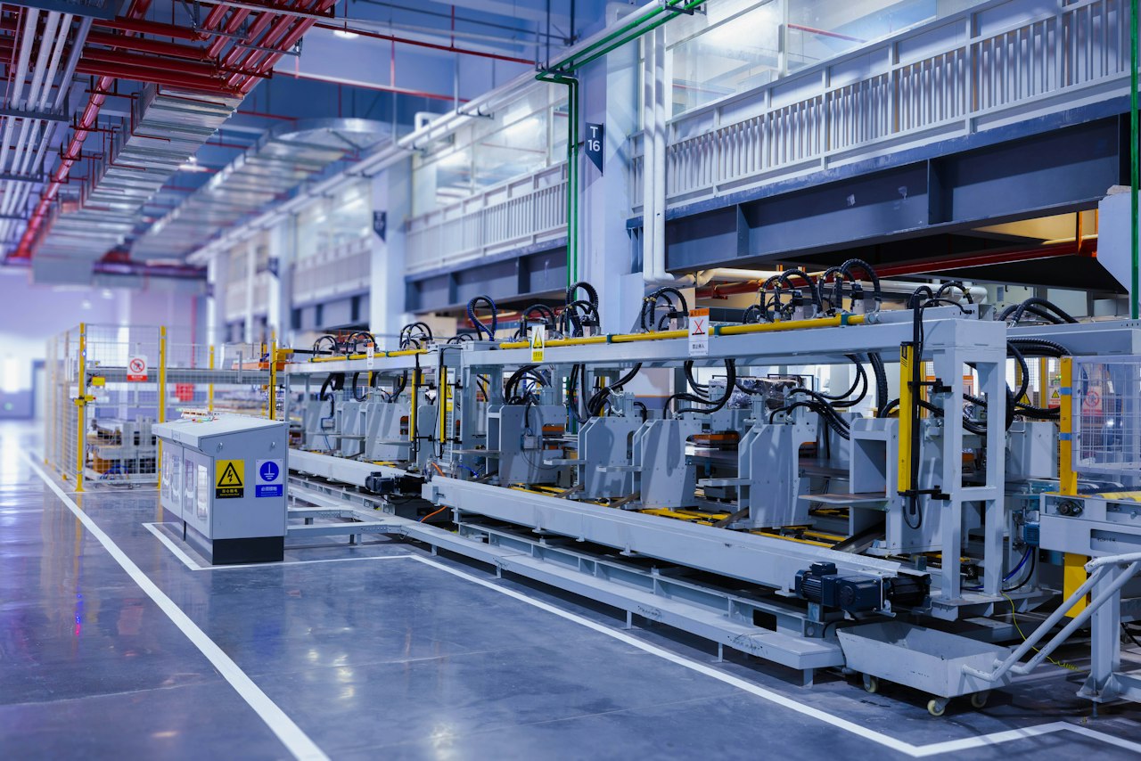 An automated conveyor line running through a factory