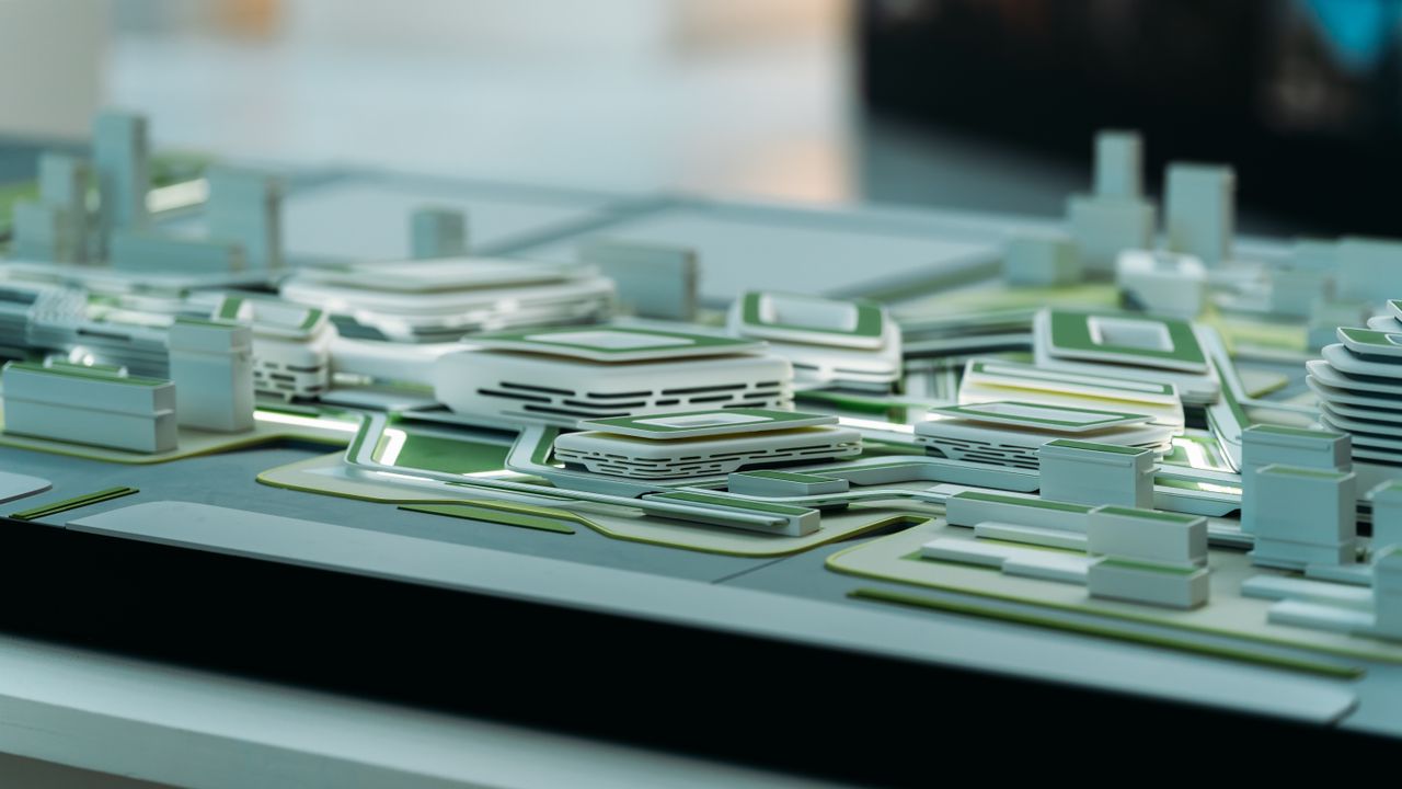 A scale architectural model under construction