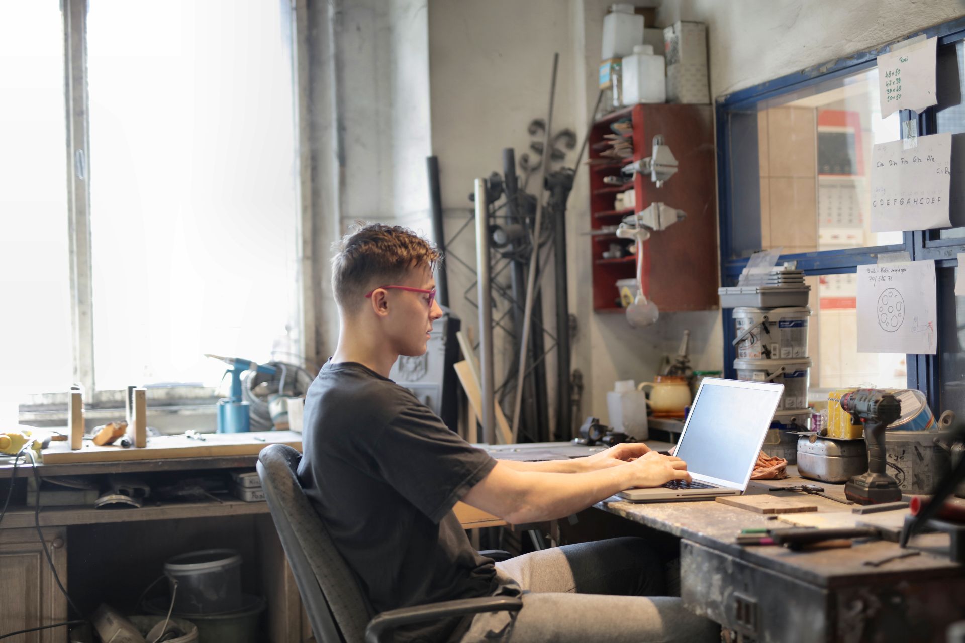A technician diagnosing a fault on a laptop