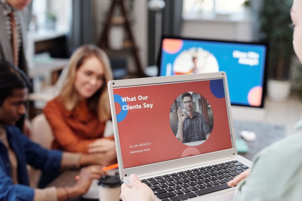 An about-us page with a team photo on a laptop