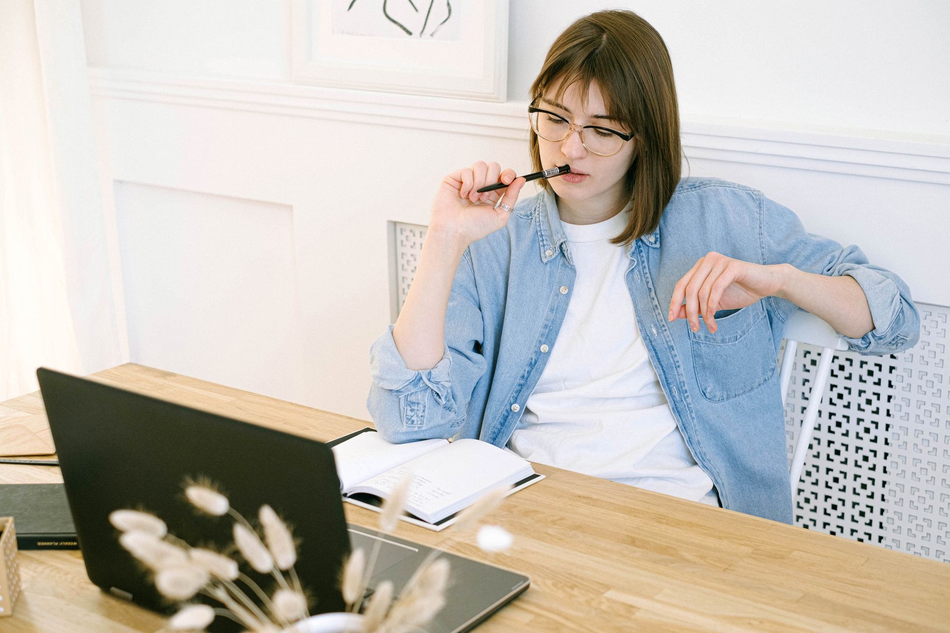 A writer at a laptop