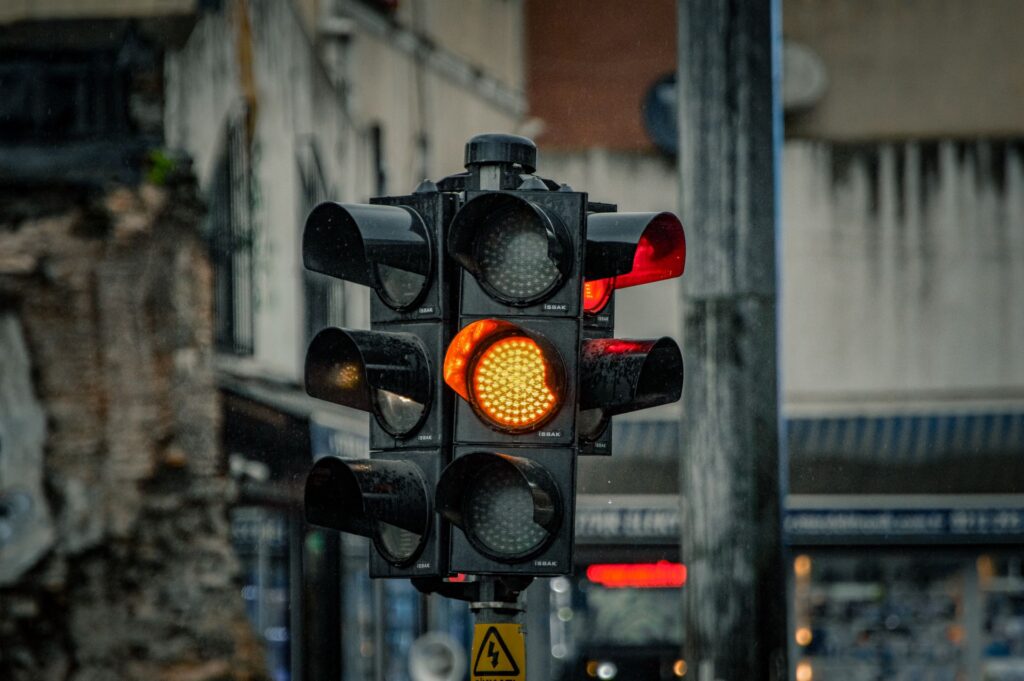 A traffic light showing amber
