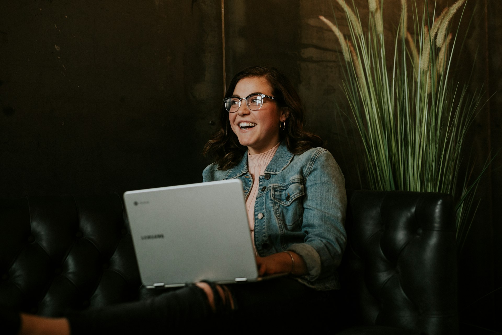 A woman reading laptop screen