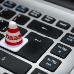 A warning notice on a laptop