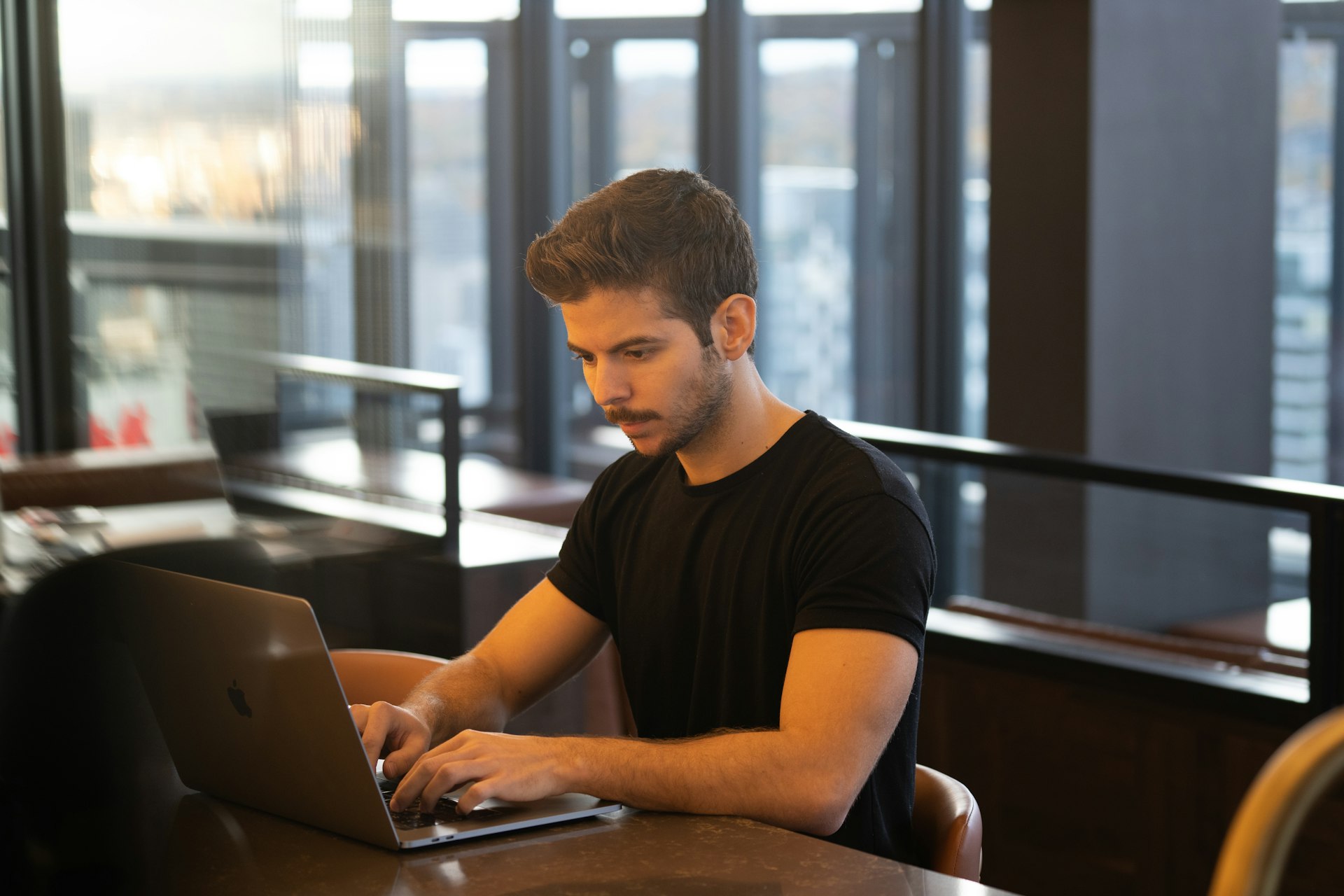 Someone reviewing payment settings on a laptop
