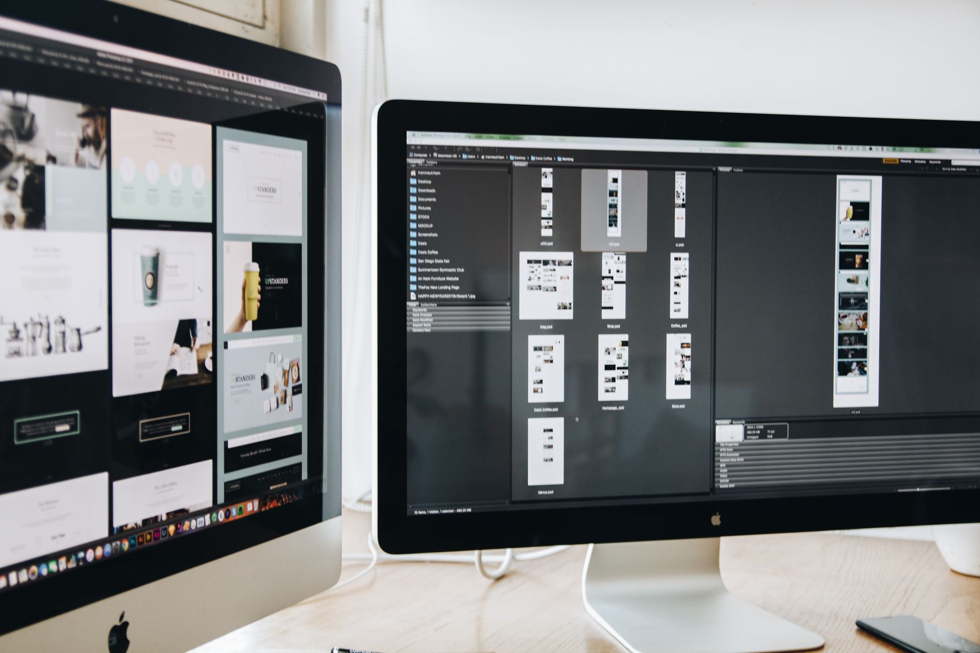 A publisher comparing ad layouts on two monitors