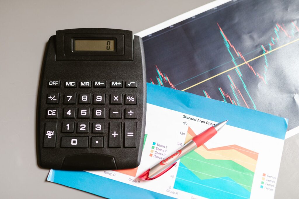 A calculator beside an affiliate report