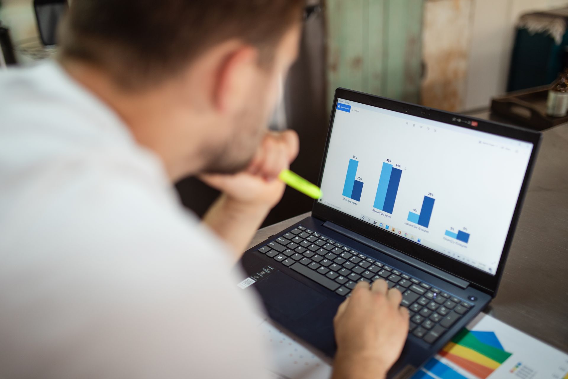 An analyst comparing reports