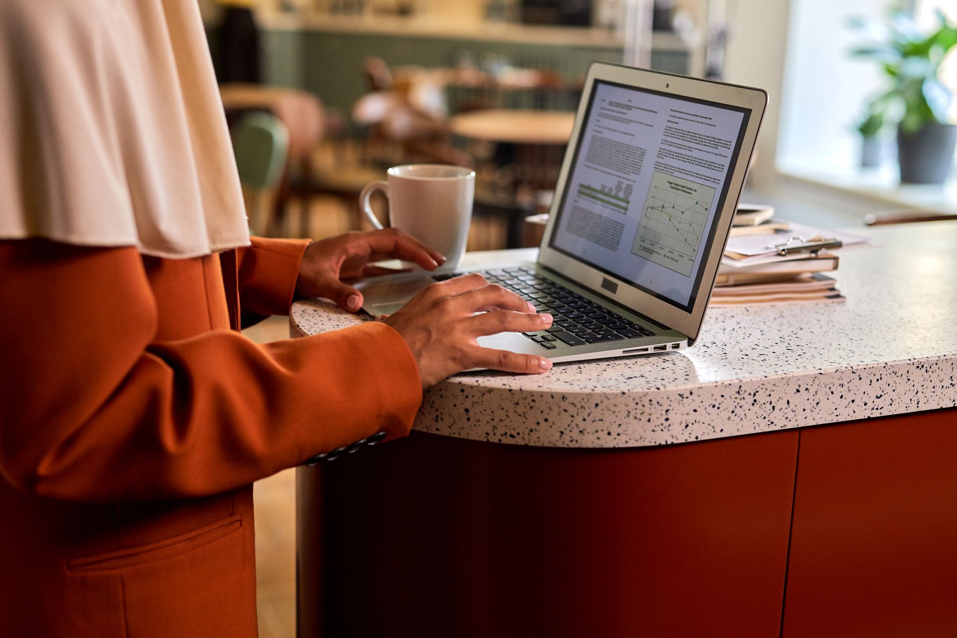A researcher reviewing browsing data on a laptop