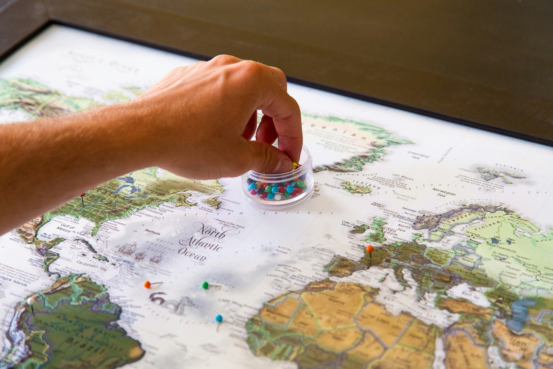 A world map with pins