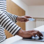A person paying by card online
