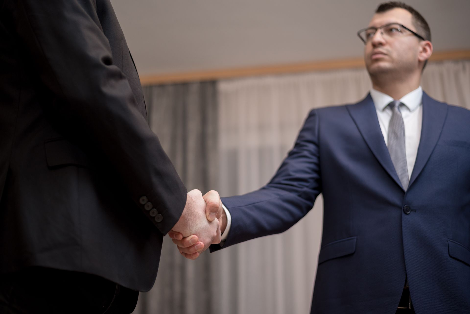 A handshake in an office