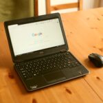A laptop showing a search engine homepage