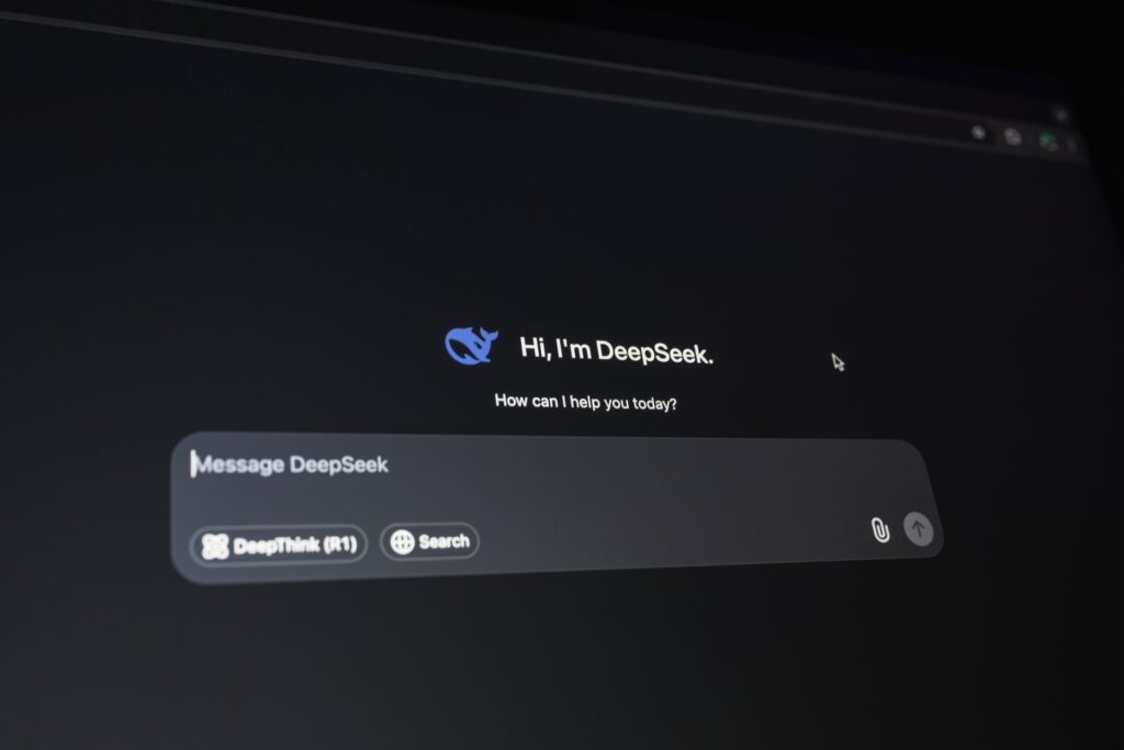An AI chat answer with cited sources on a laptop