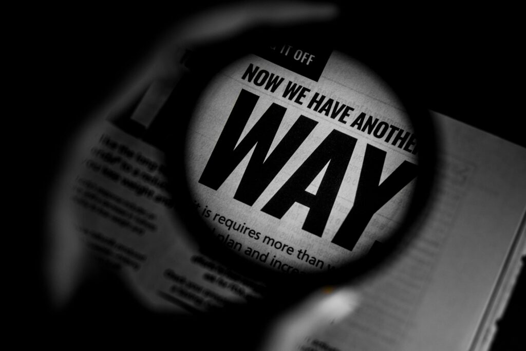 A magnifying glass over search results