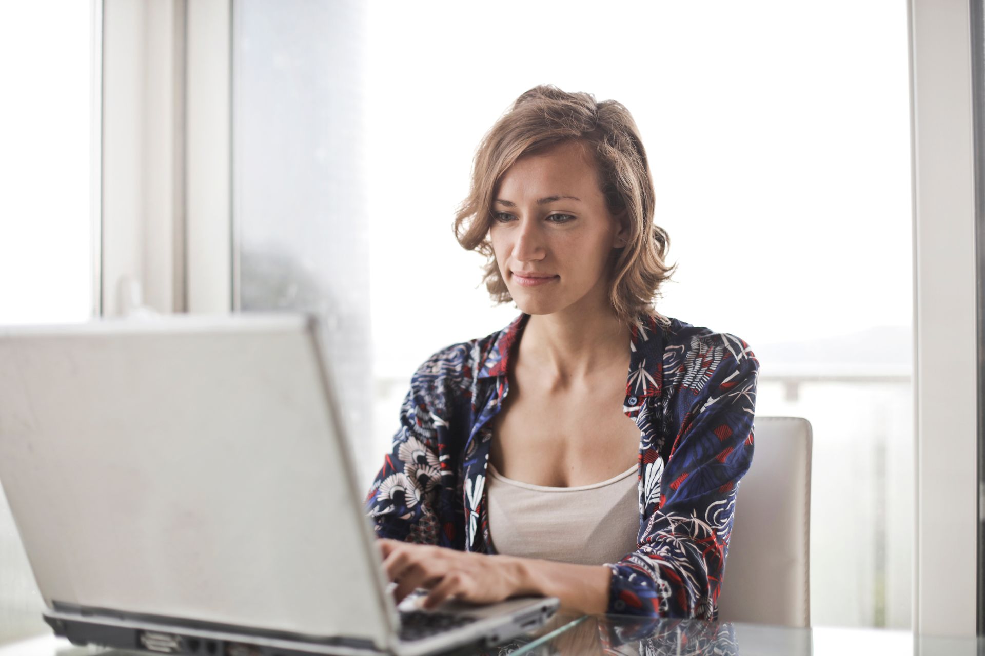 A publisher at a laptop