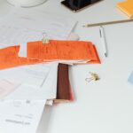 A calendar and an invoice on a desk