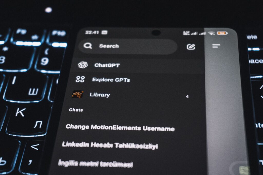 A site navigation menu with a dropdown on a laptop