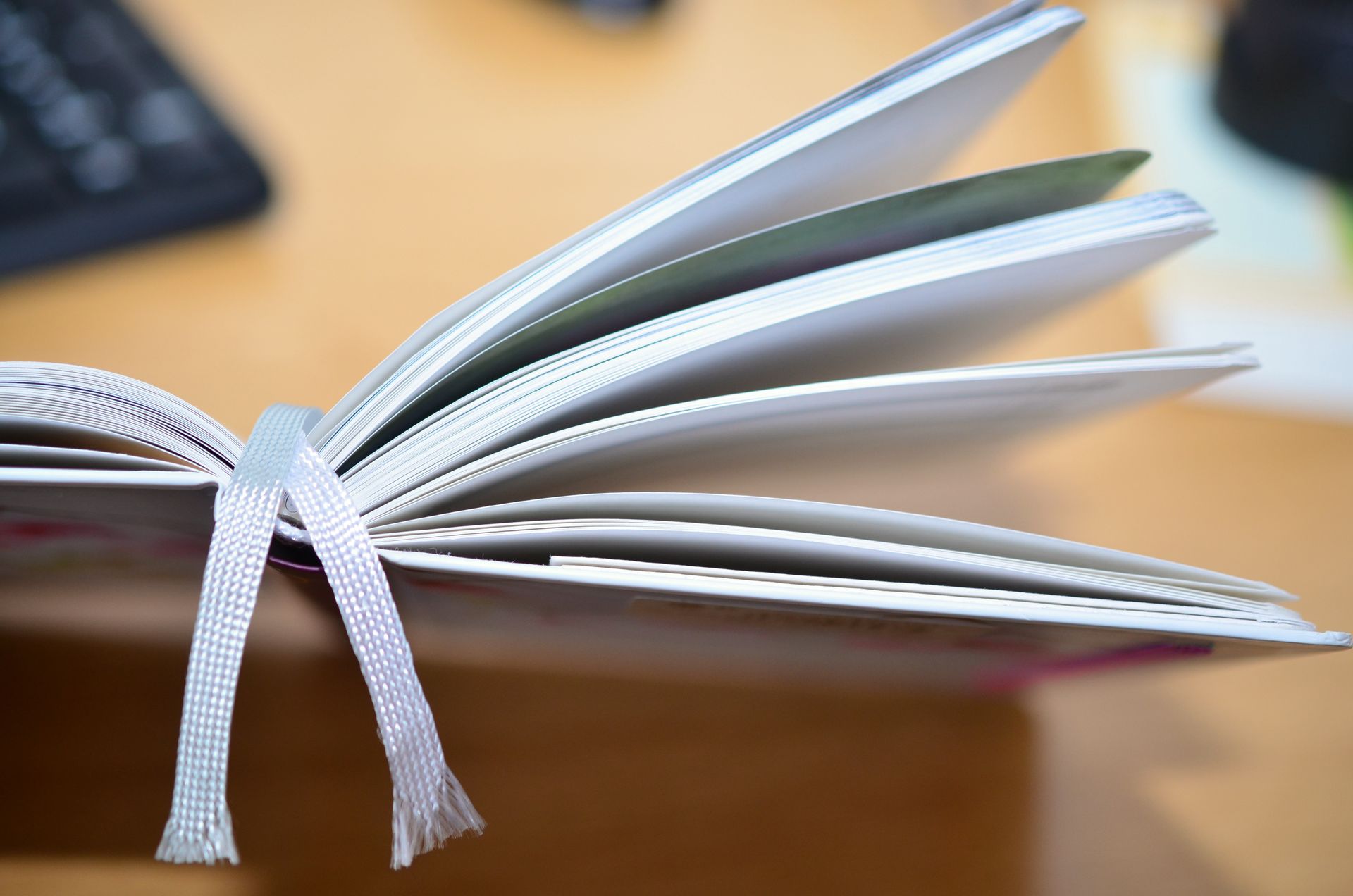 A bookmark ribbon in a book