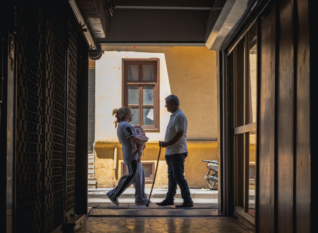 People walking through a doorway