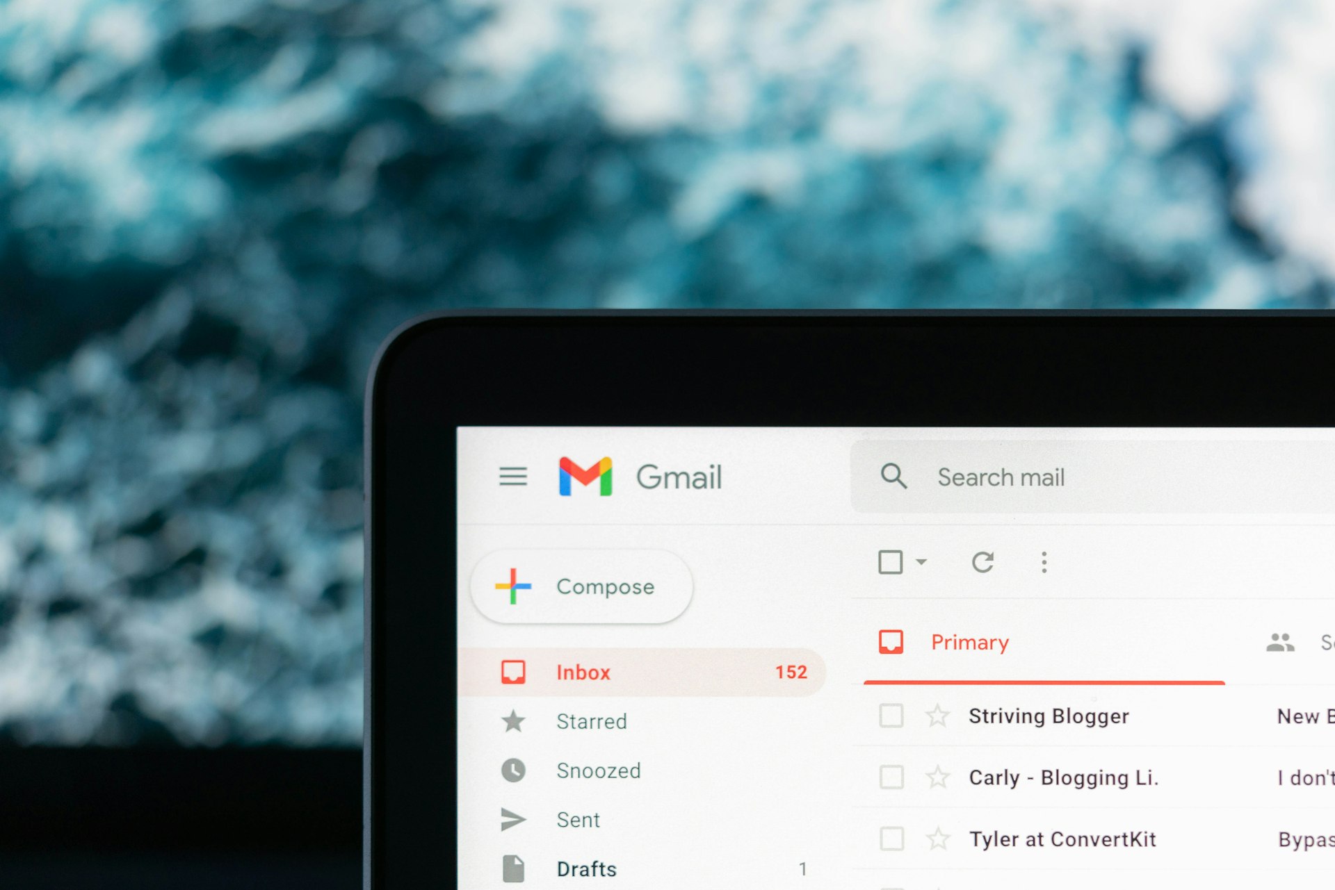 An SEO tool alert email on a laptop