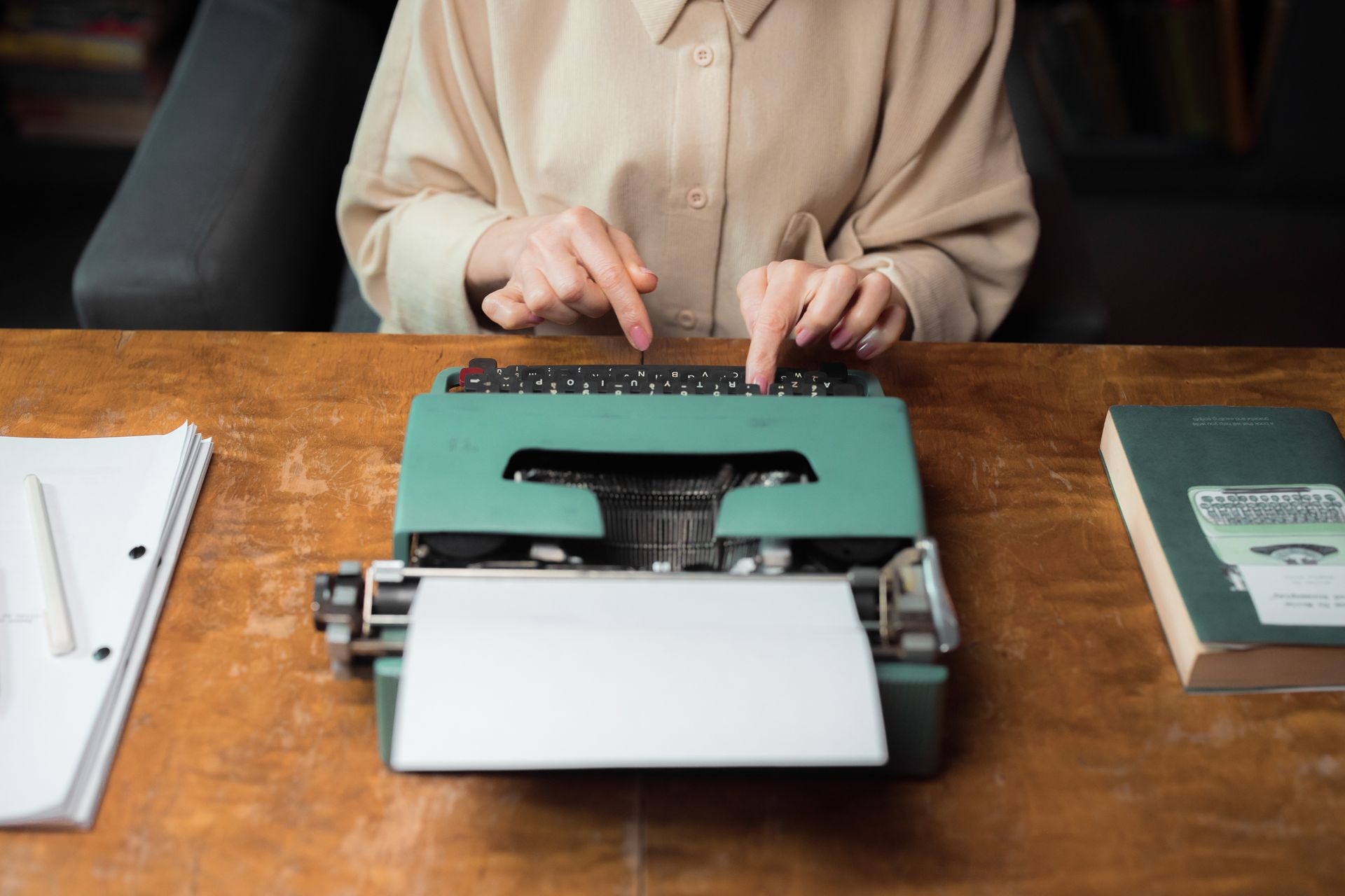 An editor publishing new content at a desk