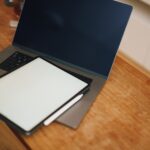 An AI writing tool drafting an article on a laptop