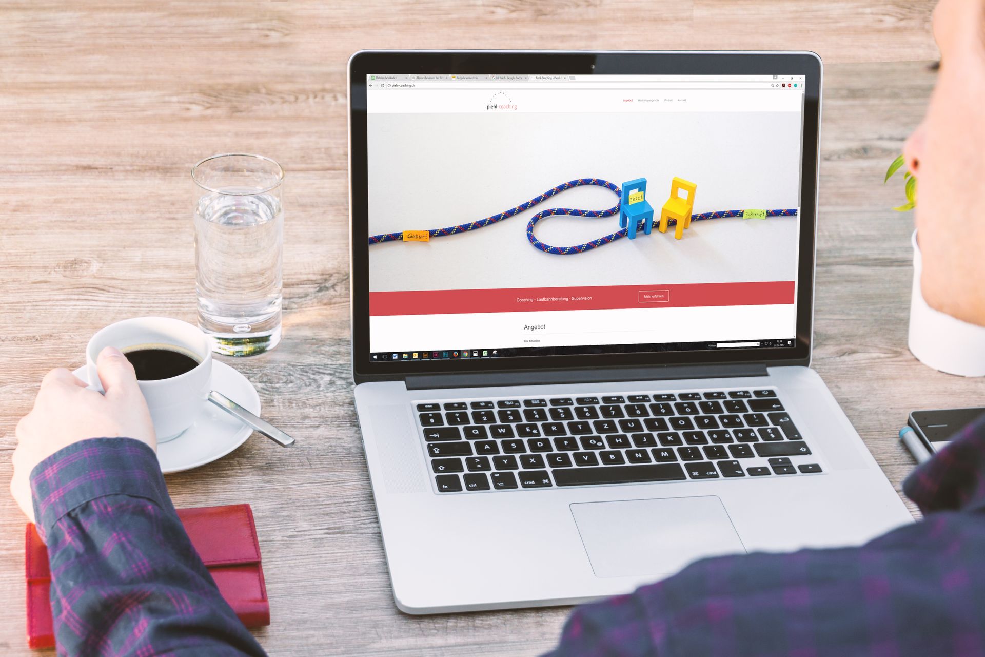 Someone building their own website on a laptop