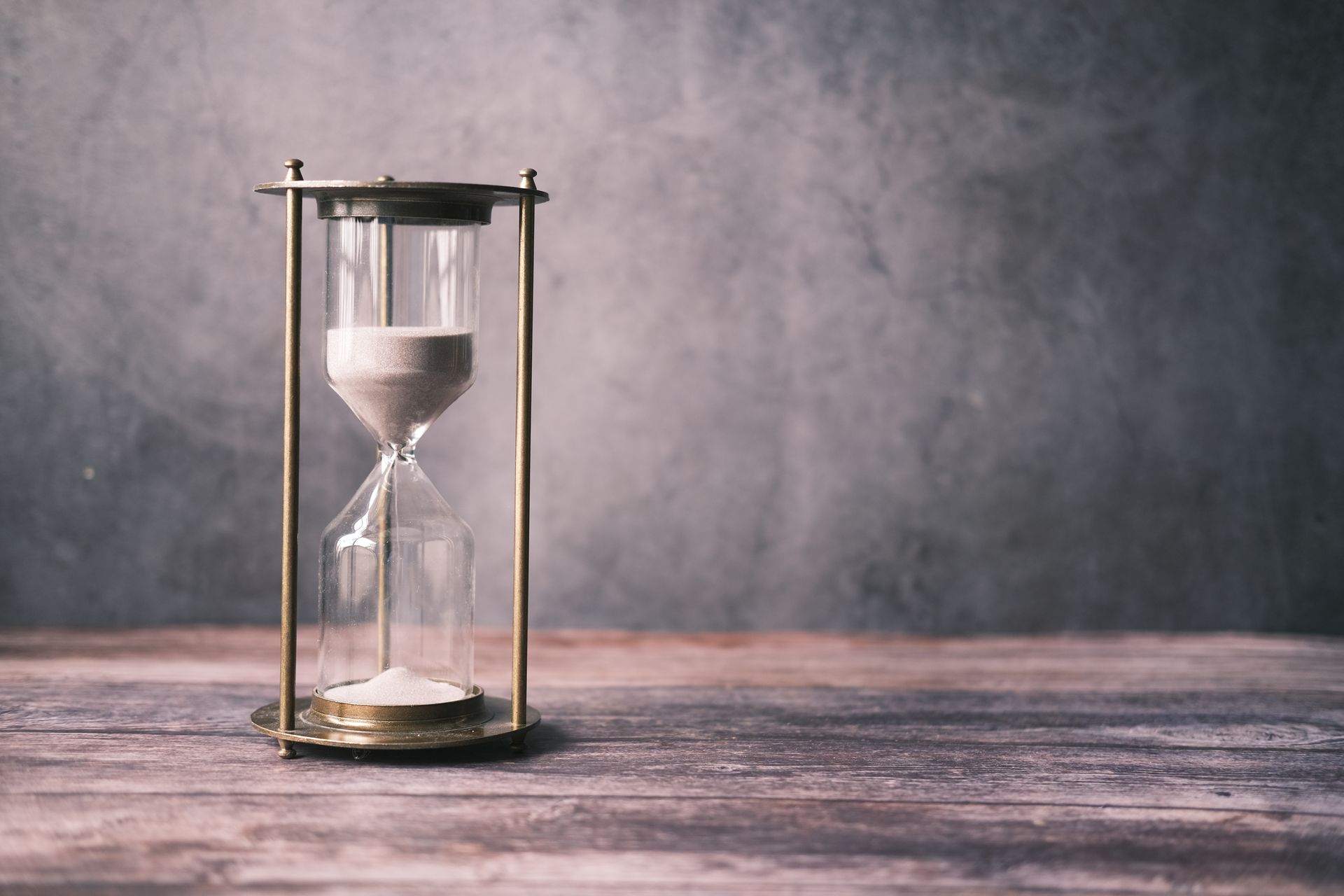 An hourglass on a table