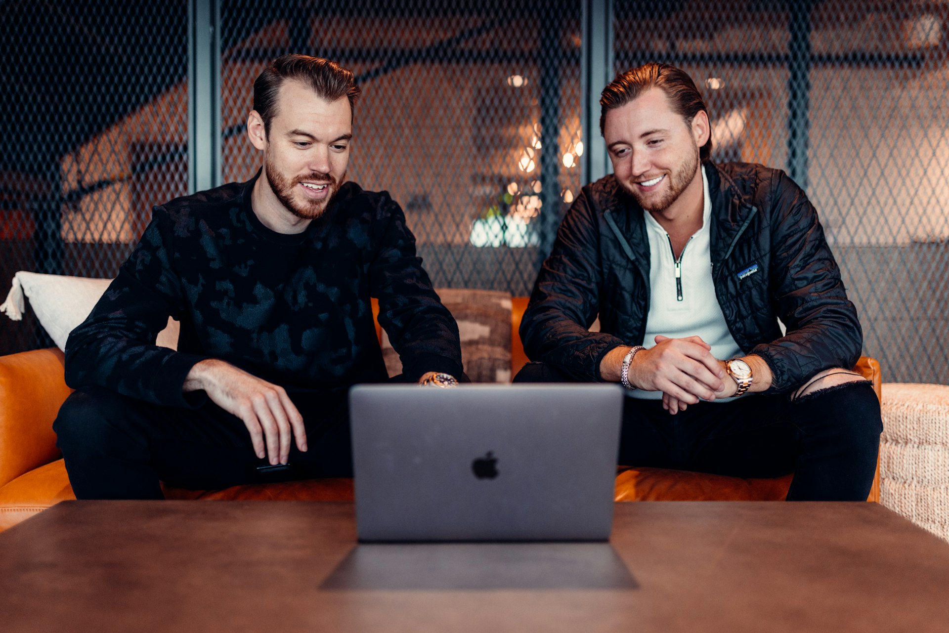 Startup founders at a laptop