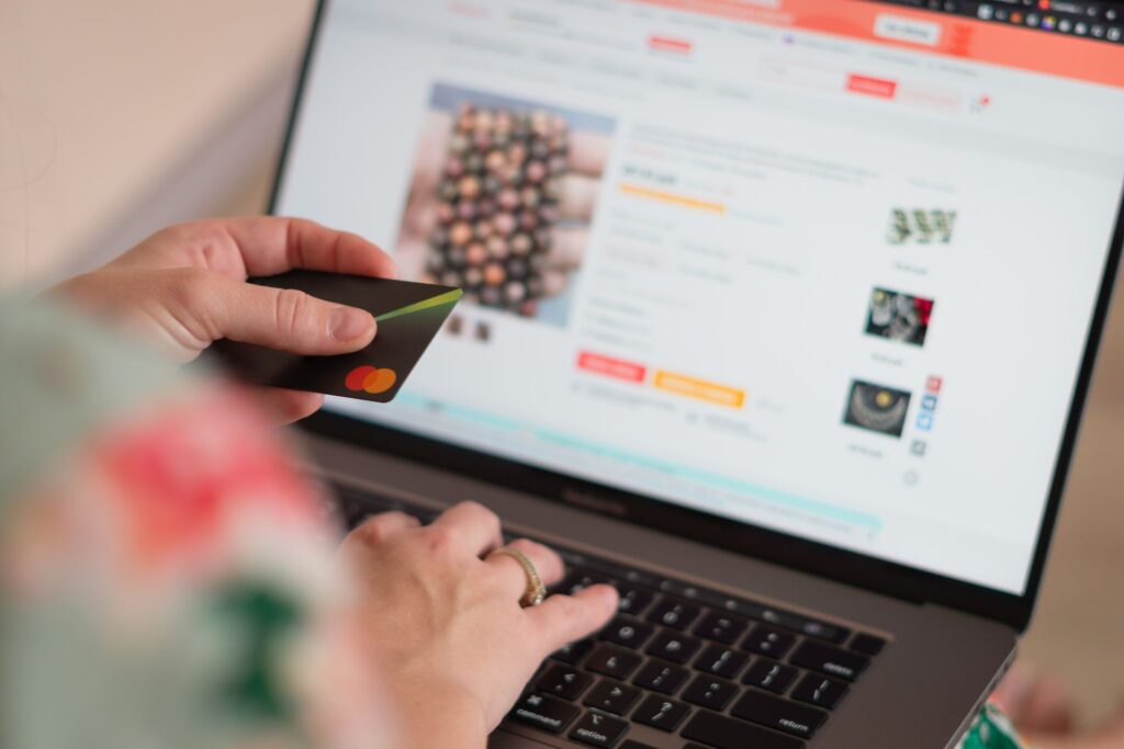 An online shop category page on a laptop