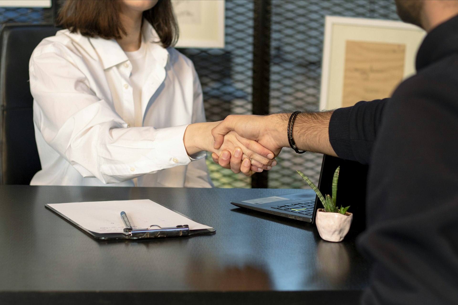 A handshake in an office