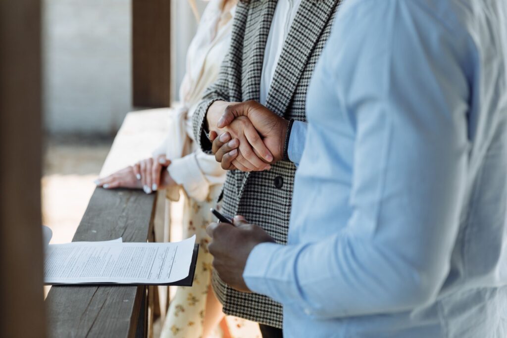 A business owner signing a contract