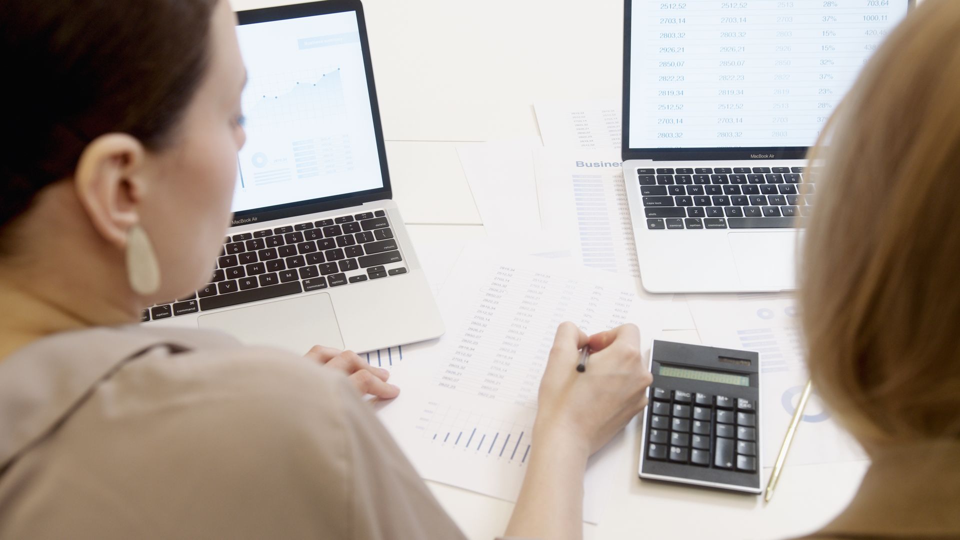 Analyst working on spreadsheet data