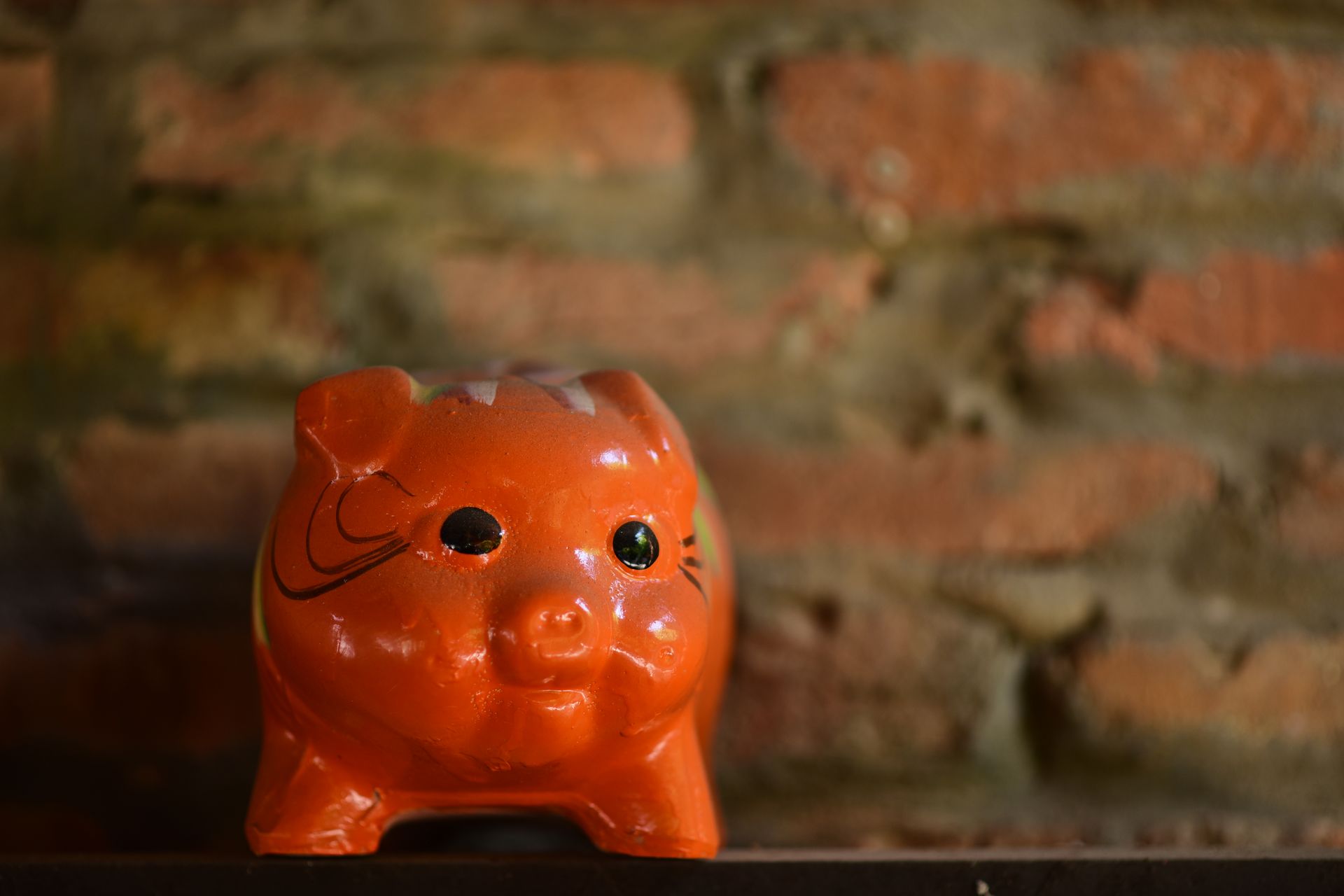 A piggy bank on a shelf