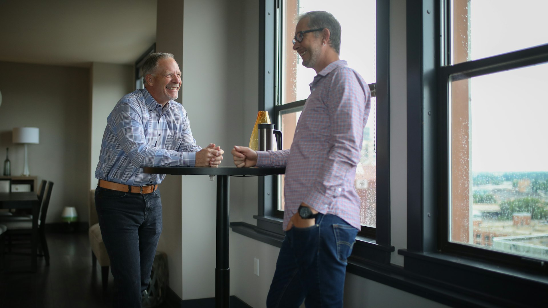 A handshake over a desk