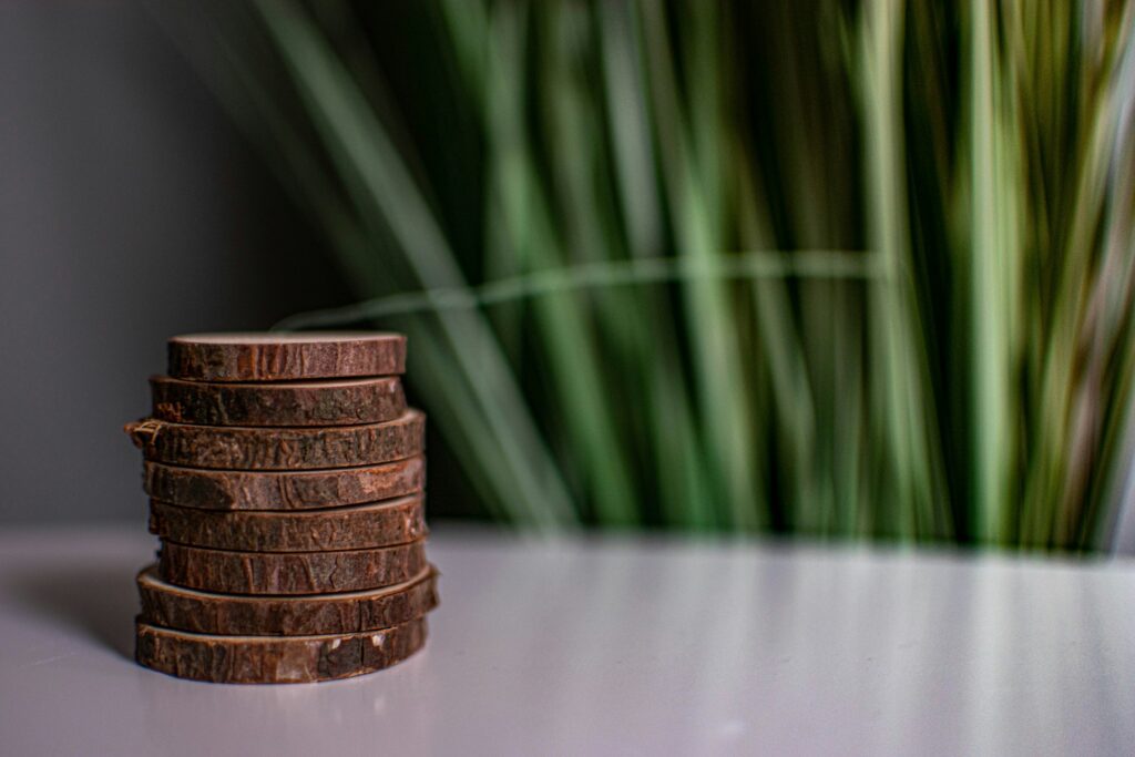 Coins stacked on a wooden table
