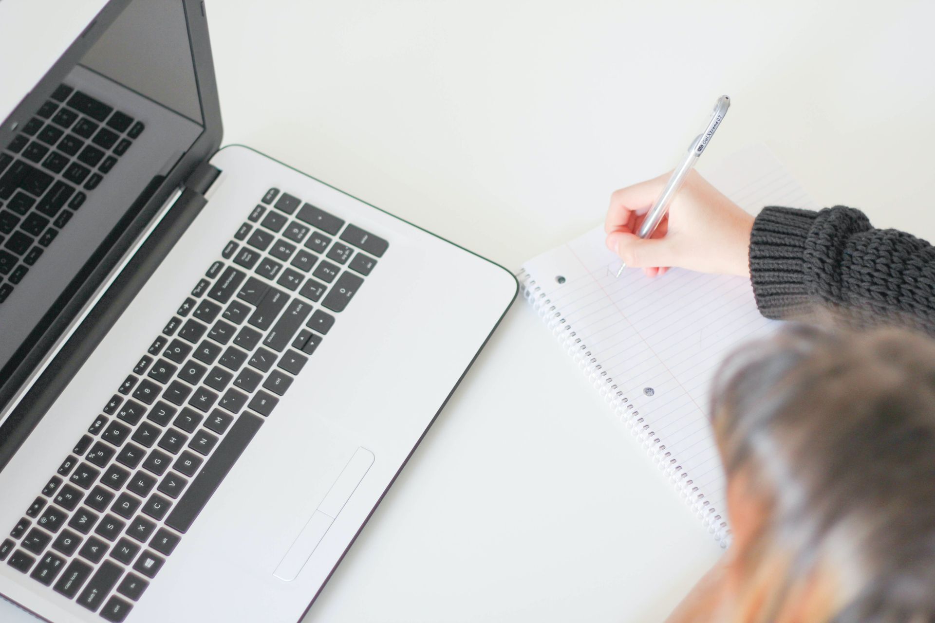 A travel blogger writing