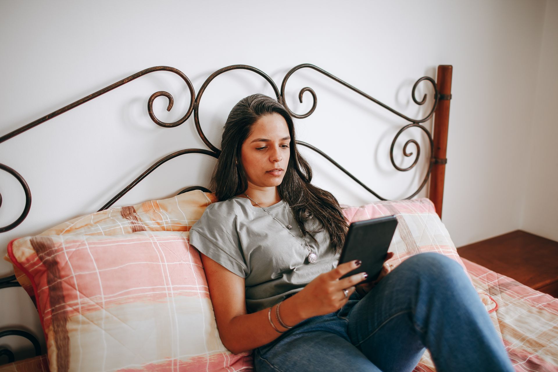 Someone reading on a tablet