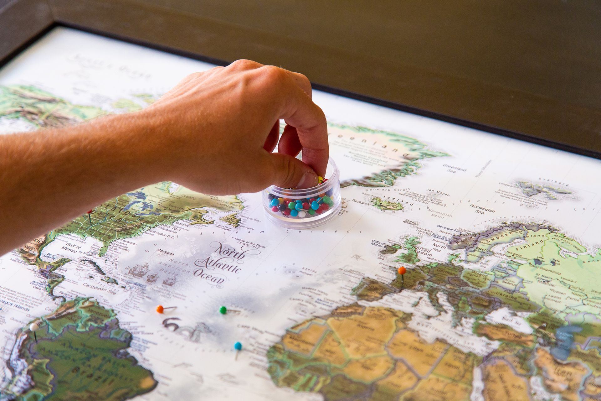 A world map with pins