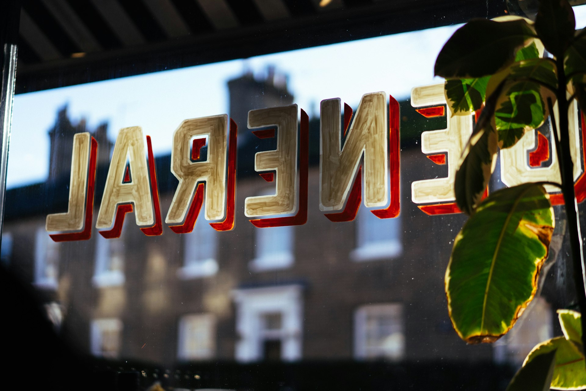 A shop sign on a building