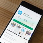 A news app showing top stories on a phone