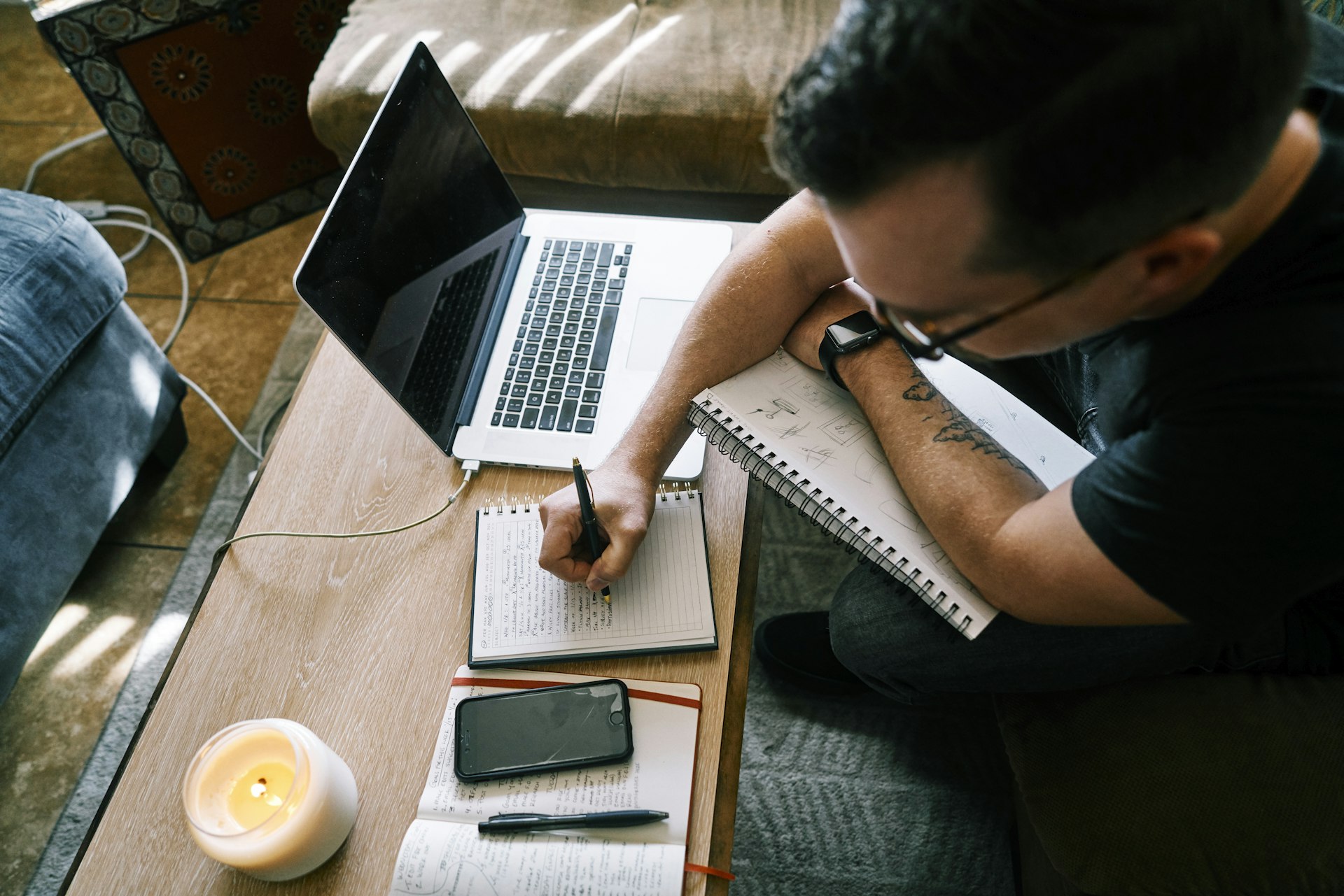 An expert writing a pitch response at a desk