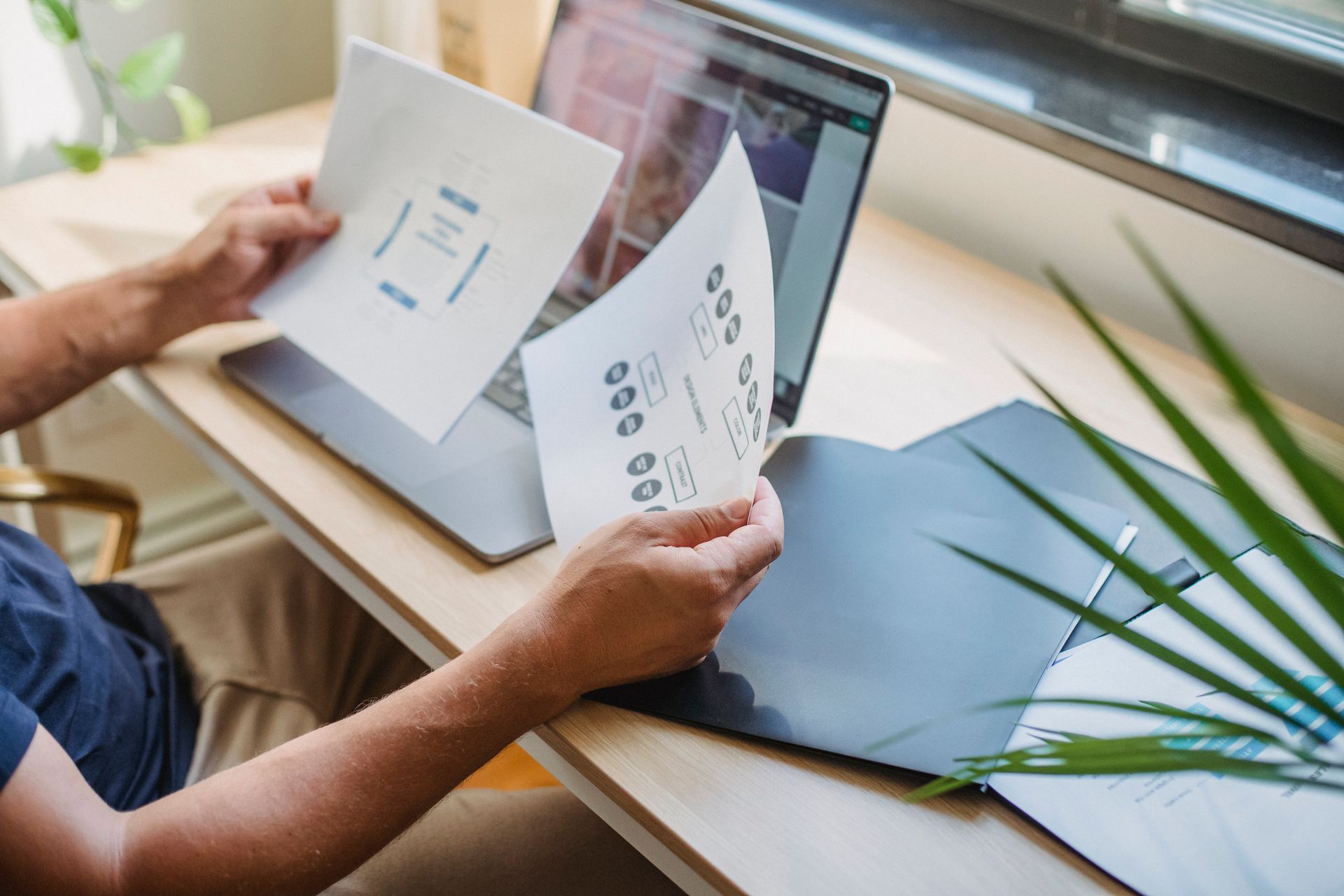 A designer reviewing a website layout