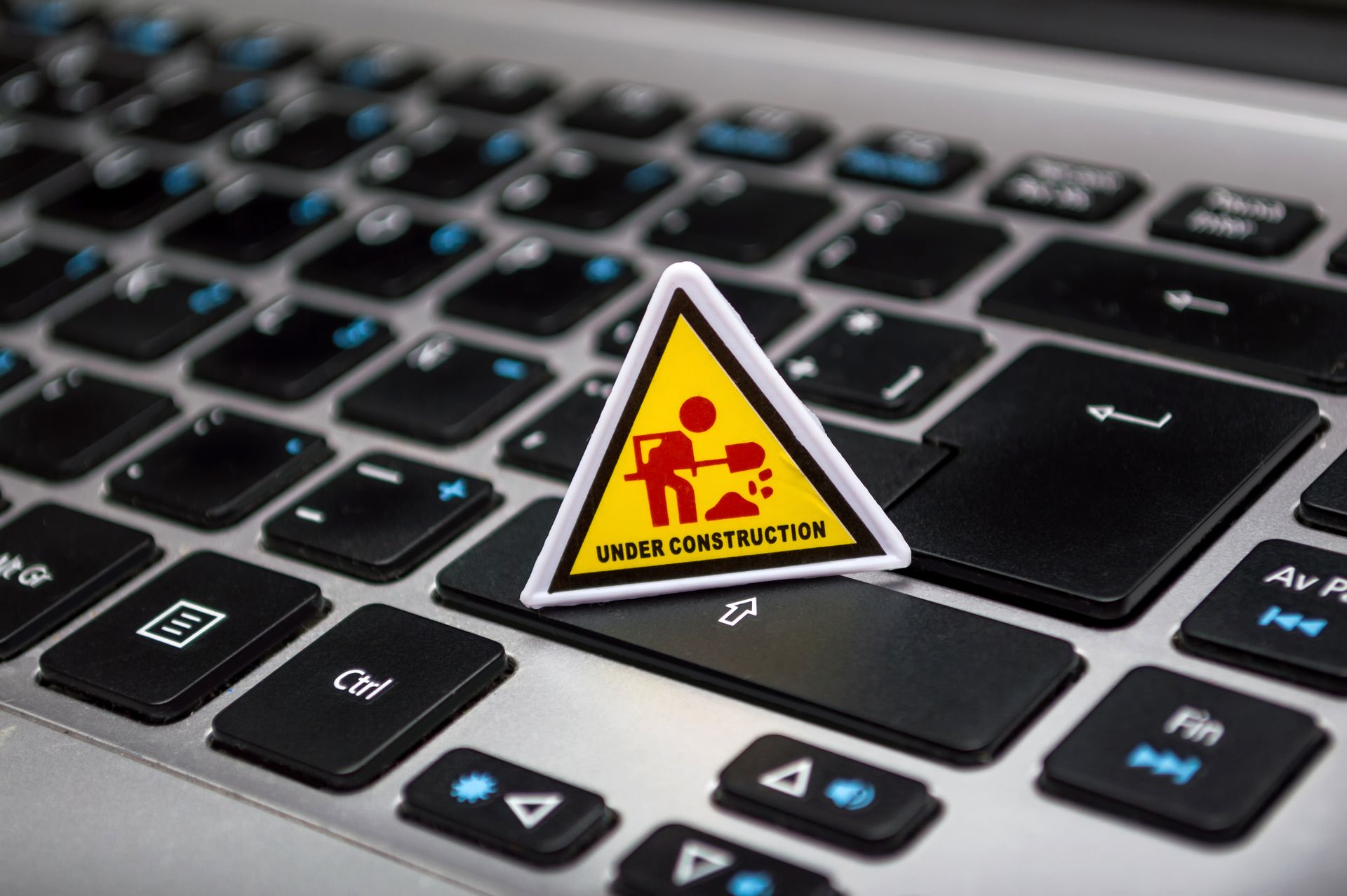 A warning sign on a laptop screen